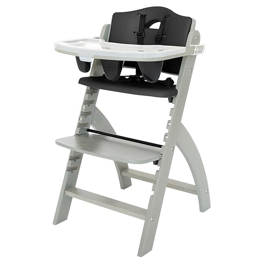 Abiie Beyond Junior Wooden High Chair with Tray - Adjustable and Convertible High Chair for Babies and Toddlers - 6 Months to 250 Lb - Water Resistant - Misty Grey Wood/Black Pearl Cushion